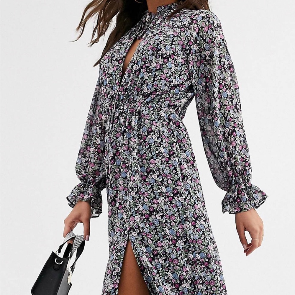 Tie neck ruffle midi dress in floral print.
